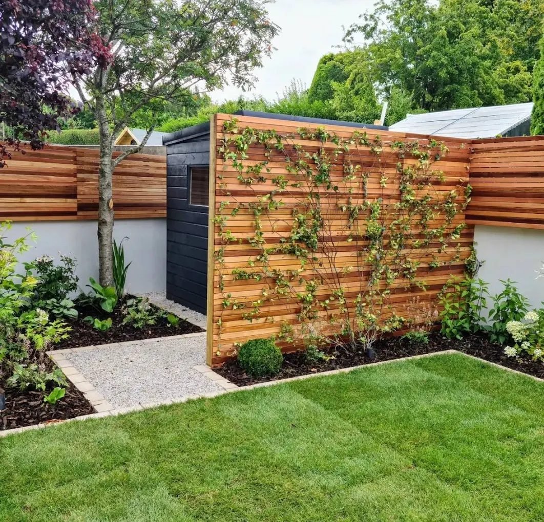 Cedar slatted screening and contemporary fencing in a landscaped Belfast garden
